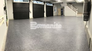 Essex County Estate places Bomanite Topping system Broadcast Flake in two large residential garages for low maintenance and design